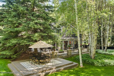 Back of home with patio
