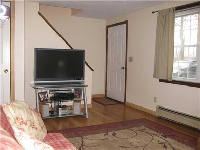 Living Room. Front door and stairs...