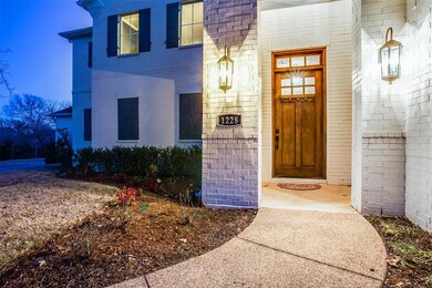 Classic craftsman door provides a warm welcome in.