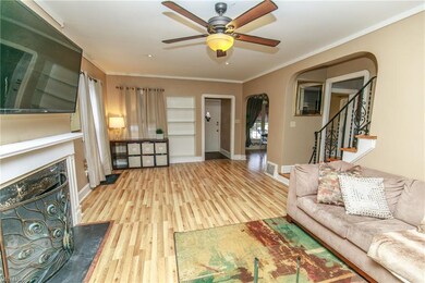 Open Floor Plan in this 25 x 13 Living Room with Luxury Flooring & Ceiling Fan ...