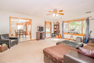 Family room with large windows.