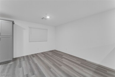 Unfurnished room featuring light wood-style floori