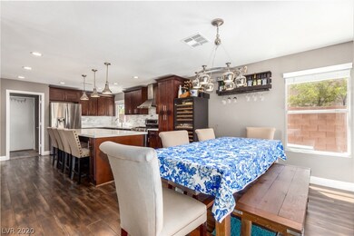 DINING ROOM OVERLOOKING THE UPGRADED KITCHEN FEATU