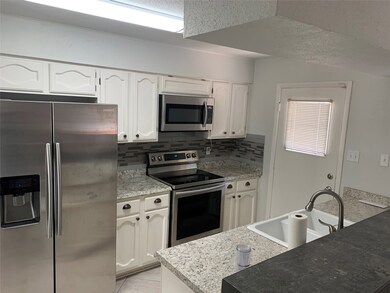 7836 Green Lawn Dr unit 7836, Houston, TX 77088 - photo 3