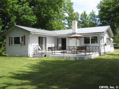 Exterior Back. Much larger ranch as you can see fr