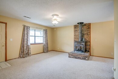 Living room with cozy wood stove.