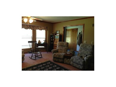 Bay window in living room and entry way.