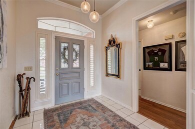 Entry and hallway to bedrooms and bathroom.