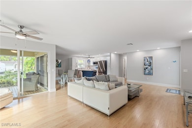 Living room featuring light wood-type flooring and
