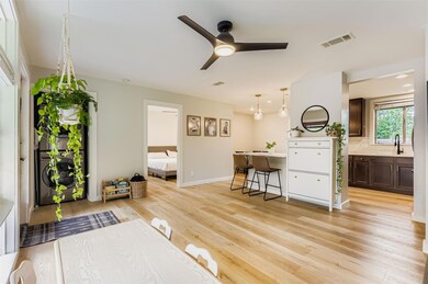 Living area featuring light wood-type flooring an
