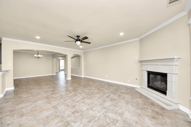 This spacious living area features neutral tones,