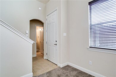 Entry way and half guest bath.