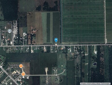 This aerial photo shows a rural setting with spaci