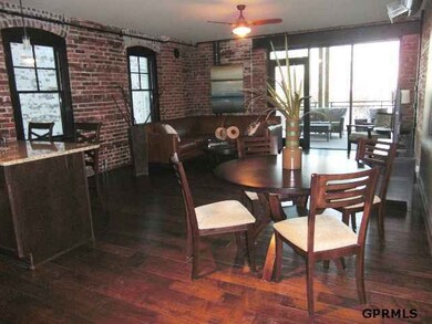 9.5' ceilings, brick walls, reclaimed wood floors, stainless appliances, granit counters.  Unique and well designed living.
