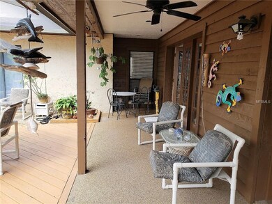 Covered lanai area at front entrance.
