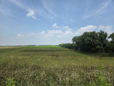 Enjoy long views with 7.5 acres of open space behind you!