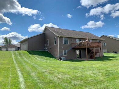 Walk-out to backyard from deck or lower level fami
