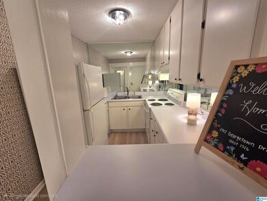 KITCHEN WITH BAR AREA