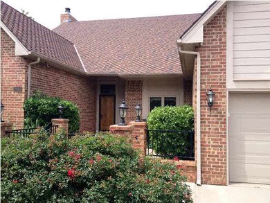 Private courtyard and lush, mature landscaping. Up