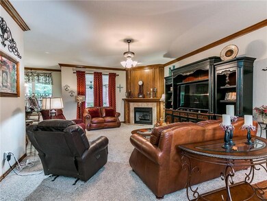LIVING WITH GAS LOG FIREPLACE. ALL WINDOWS HAVE RE