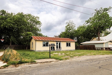 Ranch-style house with metal roof