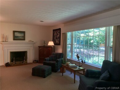 Large and Bright Living Room with Gas Fireplace