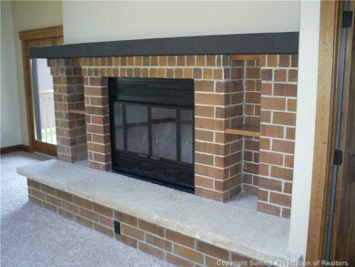 Interior Space/Layout. Wood burning fireplace