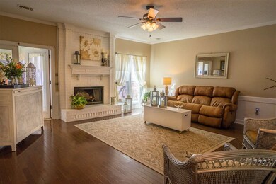 Hardwood floors, fan, wood burning fireplace! Lead