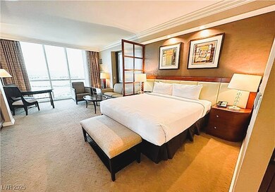 Carpeted bedroom with ornamental molding and expan