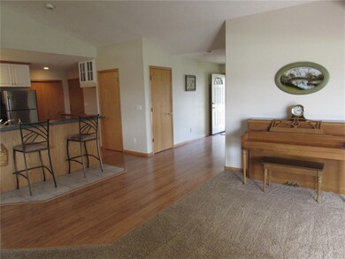 Open floor plan with room for formal dining area.
