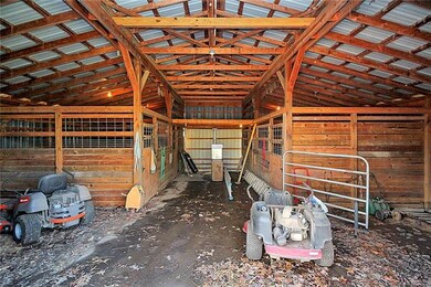 Four stall barn (room for 6 stalls) with hay loft