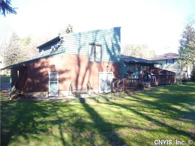 Exterior Back. Deck off dining area and back of ho