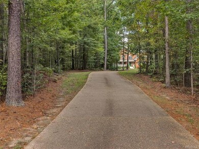 You enter the property via a winding aggregate dri