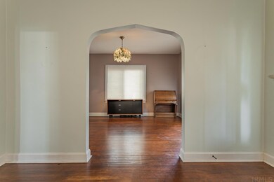 A pretty arched doorway to the Dining Room, that c