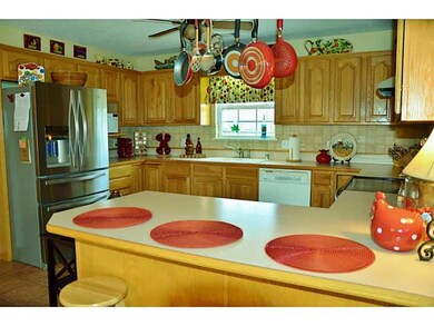 Kitchen. Kitchen was built by a custom cabinet maker with tons of storage and beauty, plus counter seating.