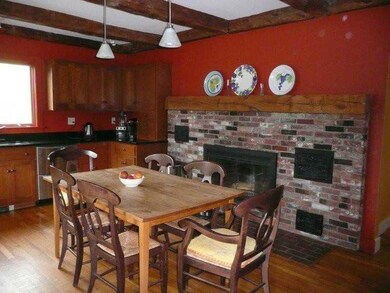Kitchen. With wood floor and working...