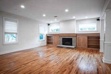 Spacious light-filled family room. Photos 12/2022