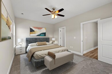 Bedroom with carpet and ceiling fan