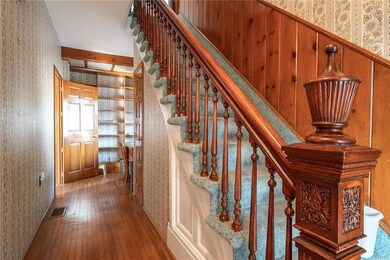 Stunning Foyer with molding details not found in t