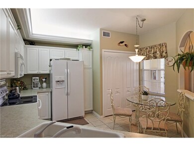 Meticulous, Bright and Cheery Kitchen.  Laundry In