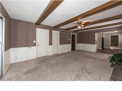 Main floor family room with brick wood burning fir