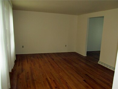 Living Room. Living room is spacious, with hardwoo