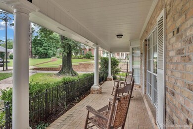 View of patio featuring covered porch