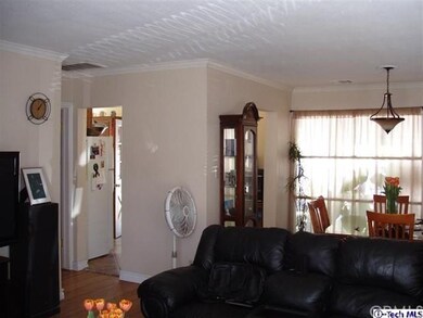 View of living room as you enter house.