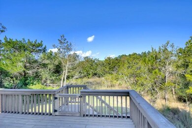 There is an open deck and a covered deck below