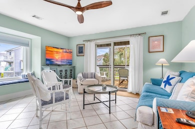 LIVING AREA - BAY WINDOW AND SLIDER THAT OPENS TO