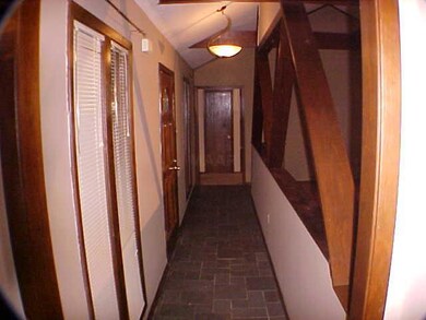 Entry Hall shares the same vaulted ceiling as the 