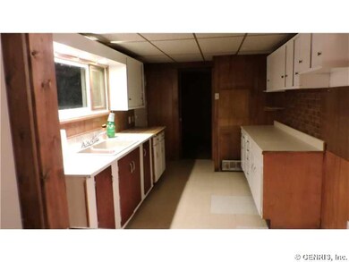 Kitchen. With sliding glass doors to enclosed porc