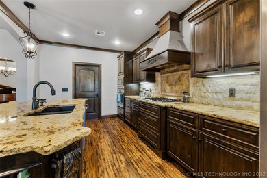 Beautiful kitchen with large center island & hand