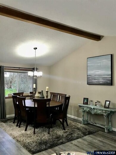 Dining Room w/vaulted ceilings & view out to river